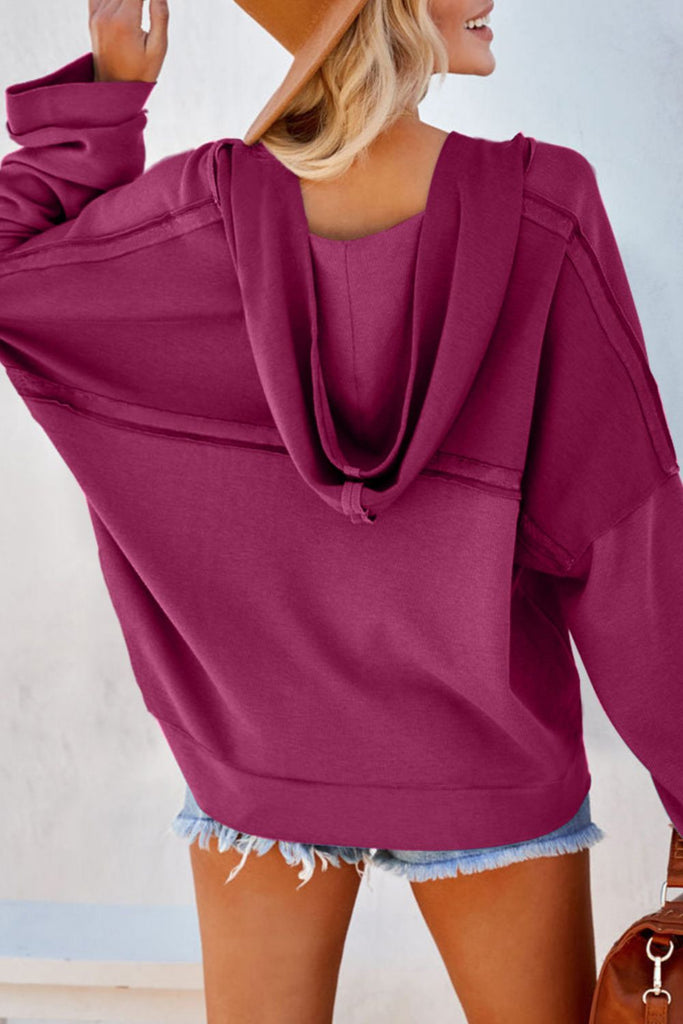 Quarter-Button Exposed Seam Dropped Shoulder Hoodie Trendsi