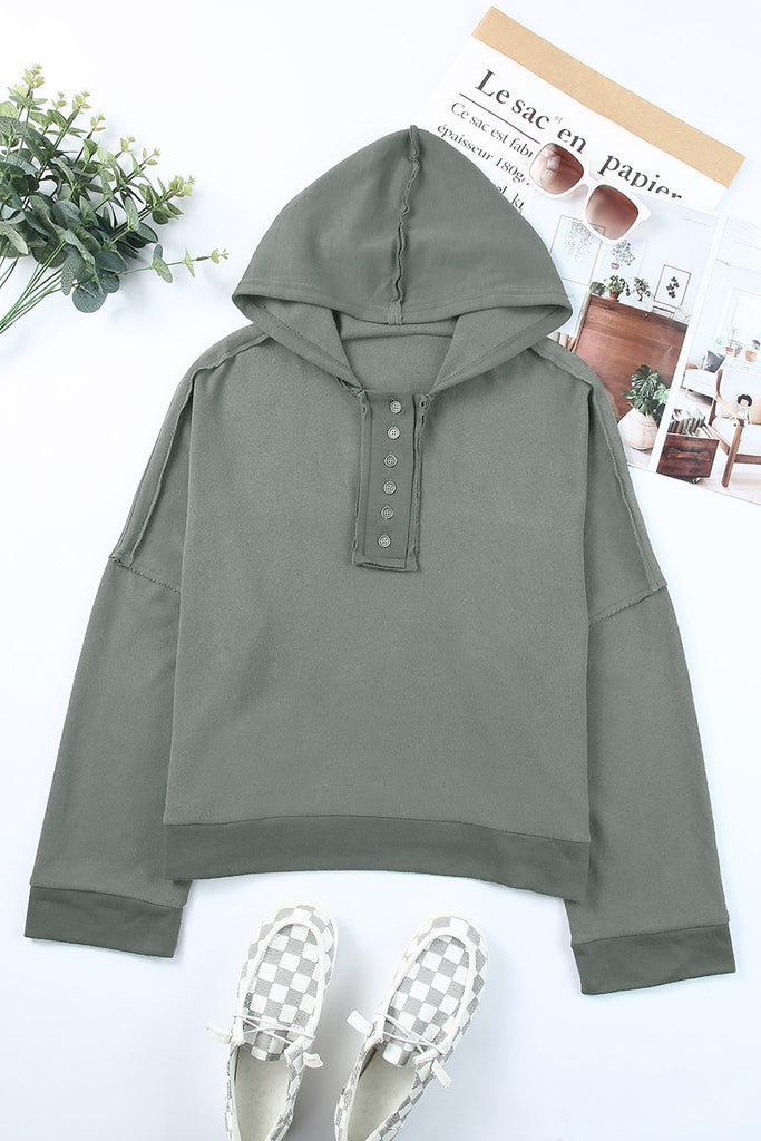 Quarter-Button Exposed Seam Dropped Shoulder Hoodie Trendsi