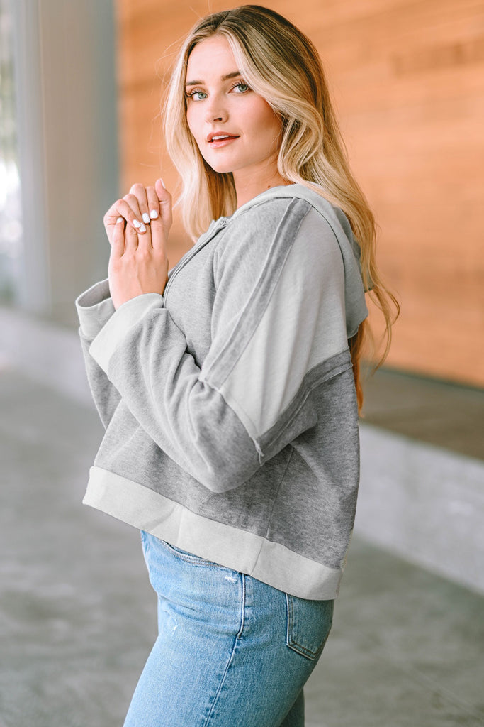 Quarter-Button Exposed Seam Dropped Shoulder Hoodie Trendsi