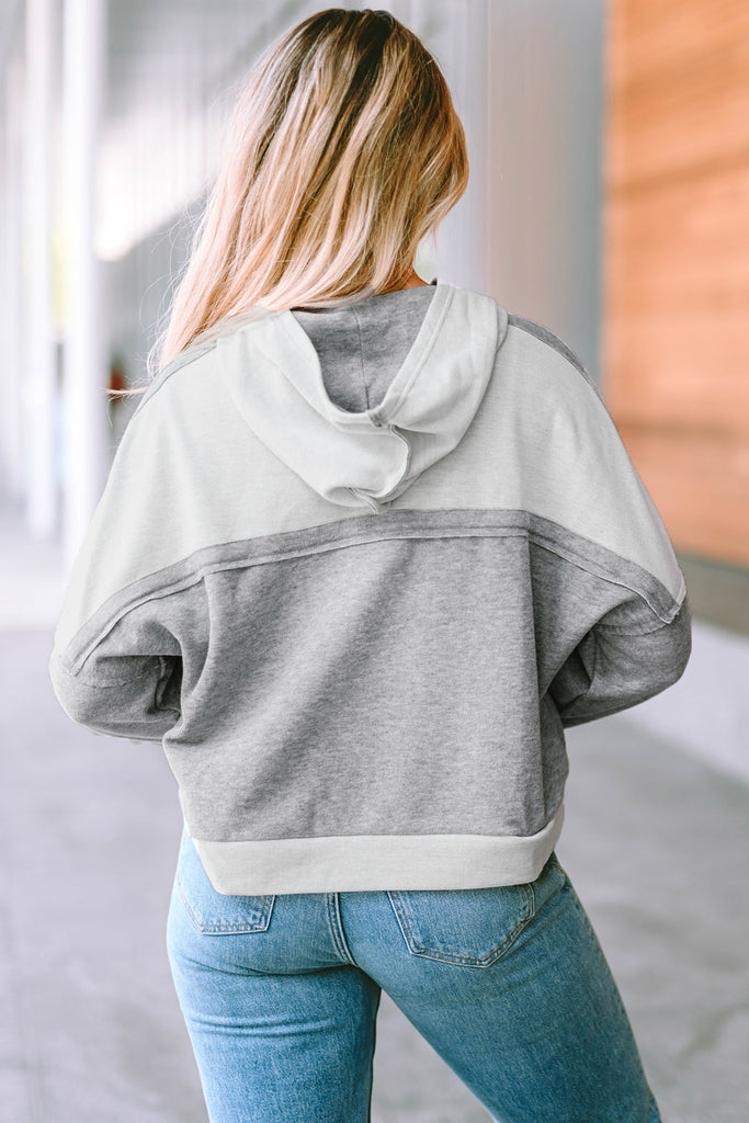 Quarter-Button Exposed Seam Dropped Shoulder Hoodie Trendsi