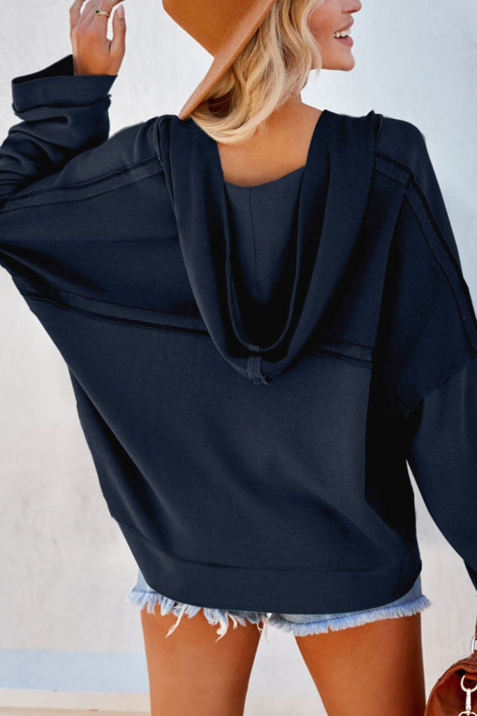 Quarter-Button Exposed Seam Dropped Shoulder Hoodie Trendsi