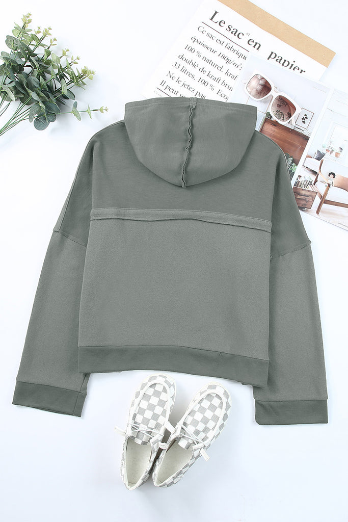 Quarter-Button Exposed Seam Dropped Shoulder Hoodie Trendsi